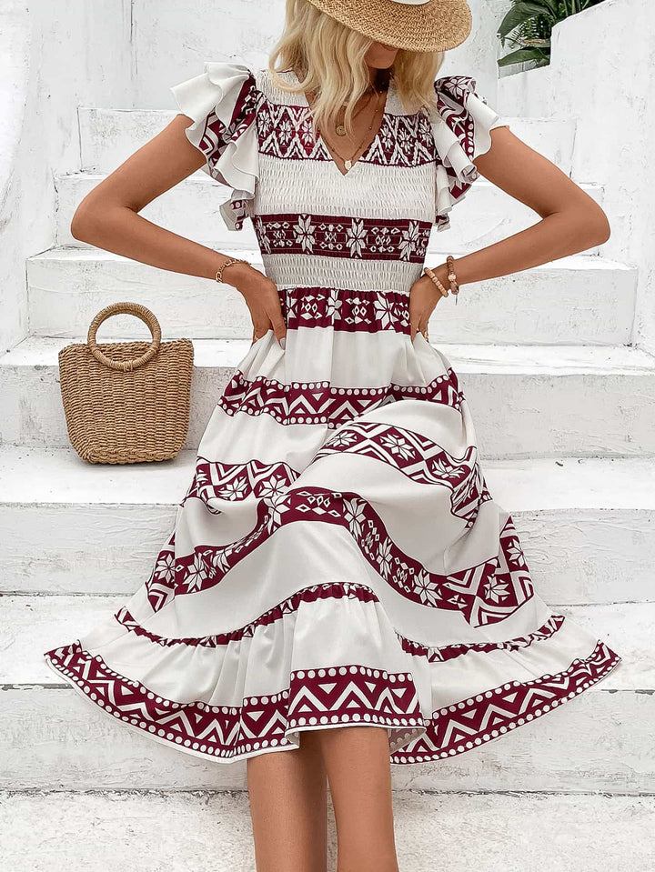 Printed V-Neck Smocked Flutter Sleeve Dress - Cheeky Chic Boutique