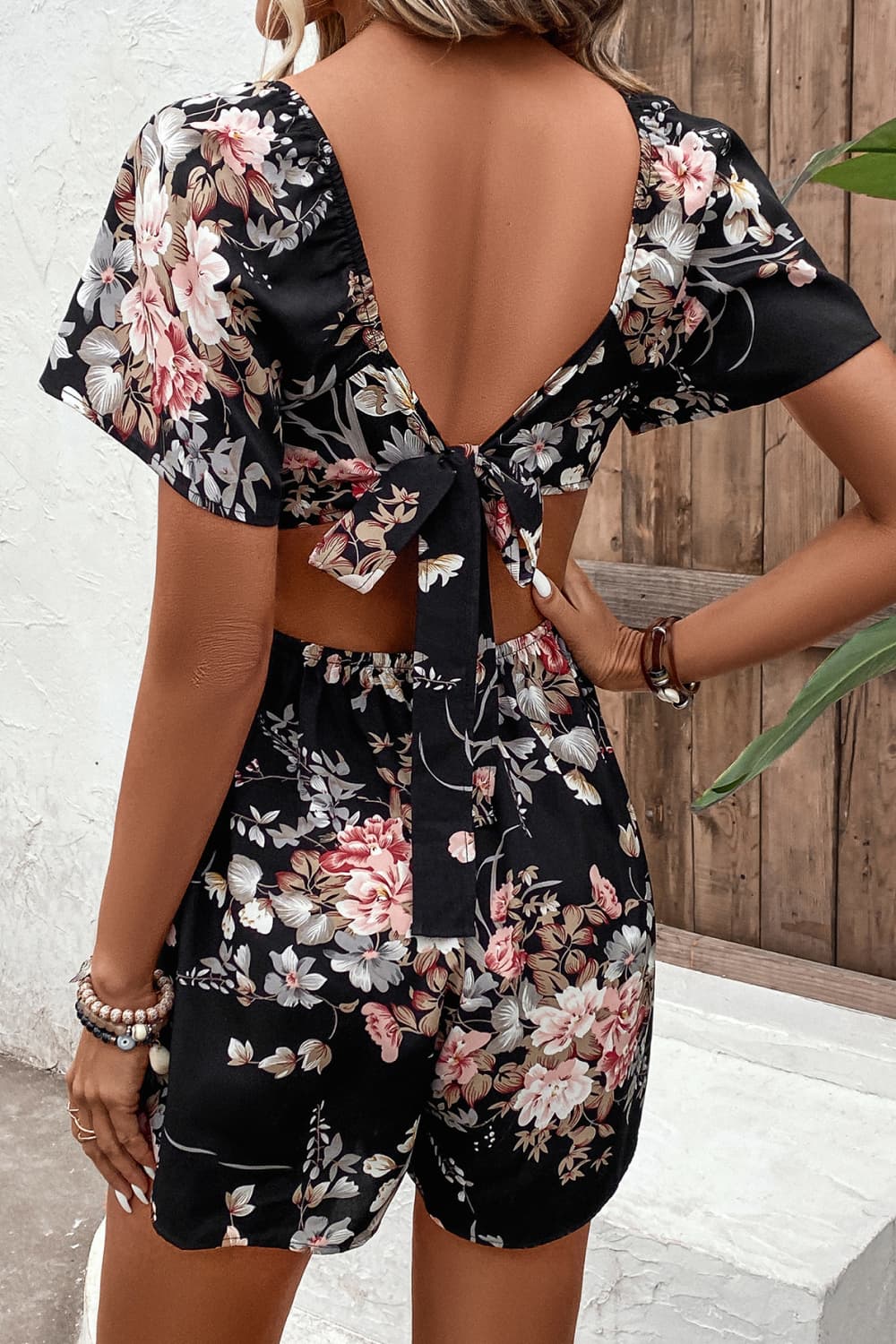 Floral Cutout Tie Back Romper - Cheeky Chic Boutique