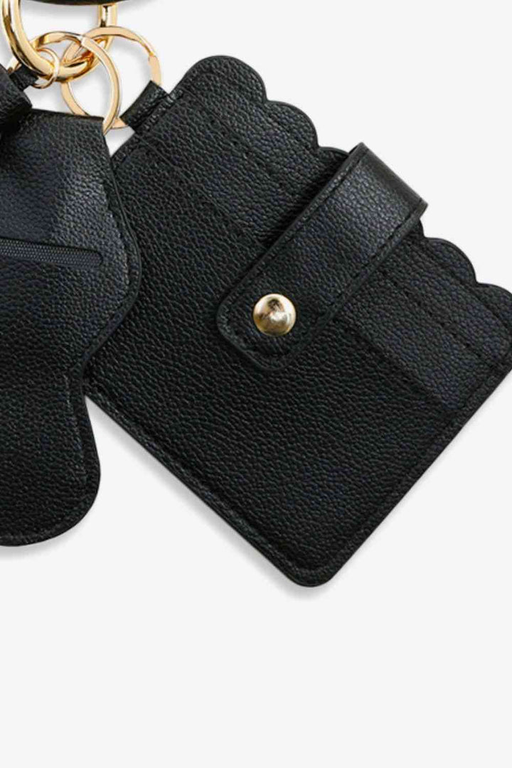 Last to Leave Wristlet - Cheeky Chic Boutique