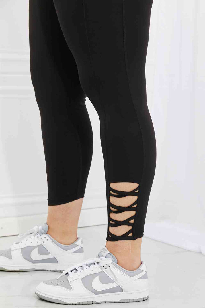 Yelete Ready For Action Full Size Ankle Cutout Active Leggings in Black - Cheeky Chic Boutique