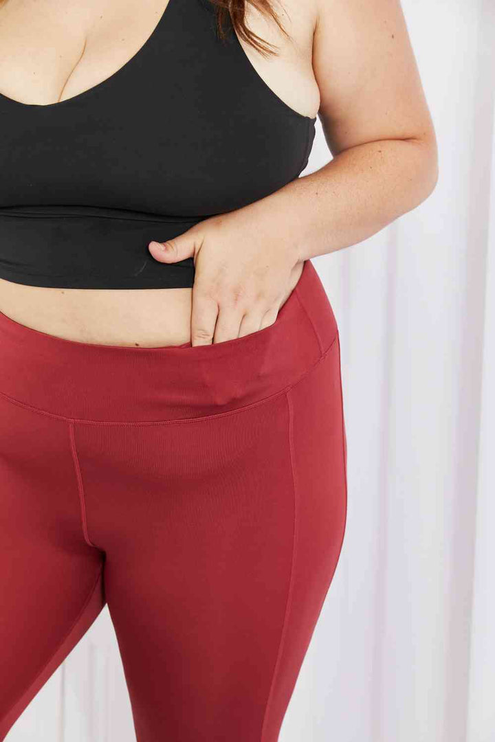 Yelete Ready For Action Full Size Ankle Cutout Active Leggings in Brick Red - Cheeky Chic Boutique