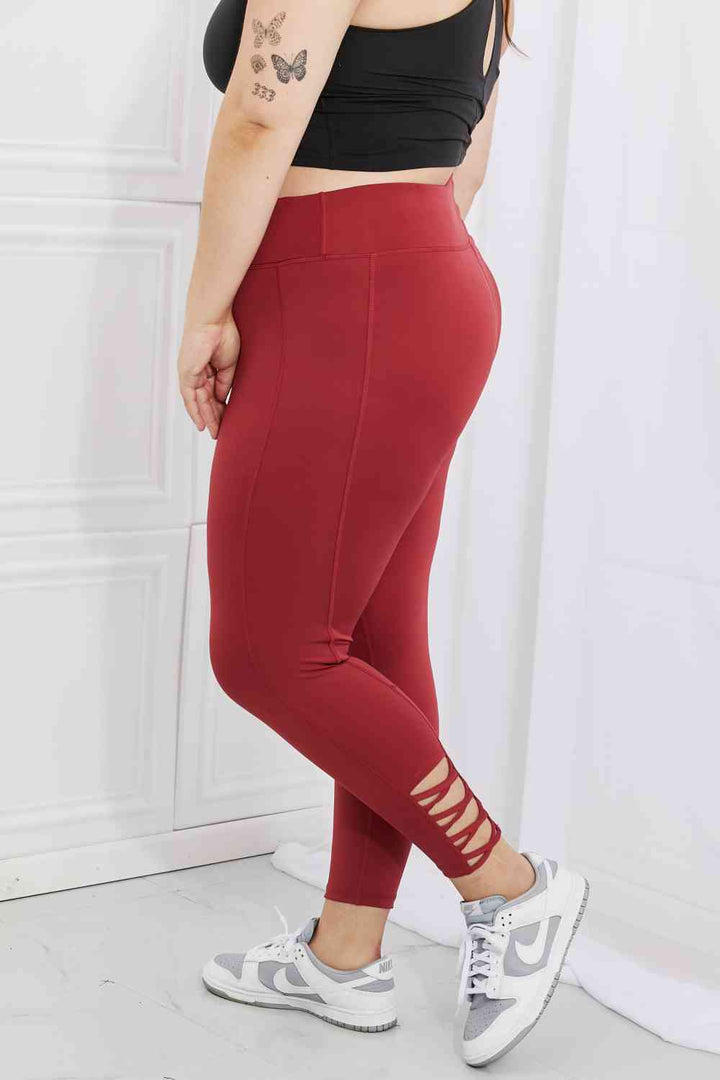 Yelete Ready For Action Full Size Ankle Cutout Active Leggings in Brick Red - Cheeky Chic Boutique