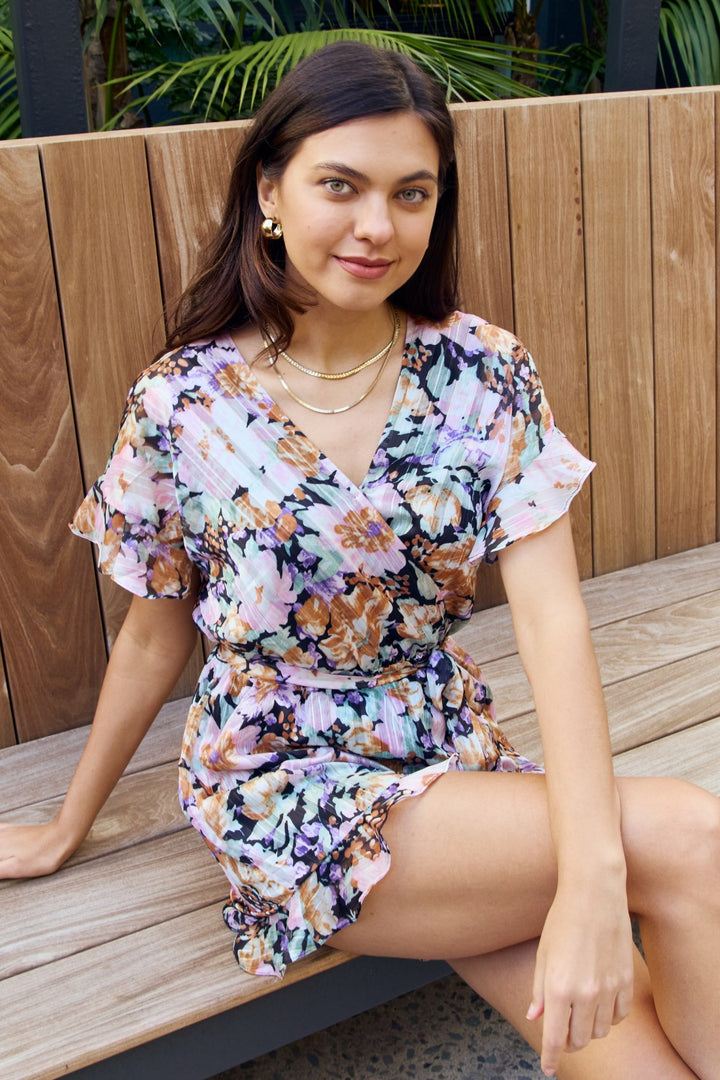 Petal Dew Full Size Floral Tie Belt Ruffled Romper - Cheeky Chic Boutique